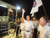 PAP Punggol East candidate Koh Poh Koon walks around greeting rally attendees at the end of the party's rally. (Yahoo! photo/Alvin Ho)