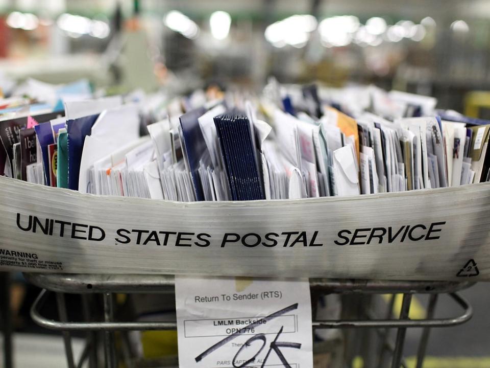 The decline in letter writing and a rise in online bill payments have produced a 20 per cent fall in business for the US mail: Getty Images