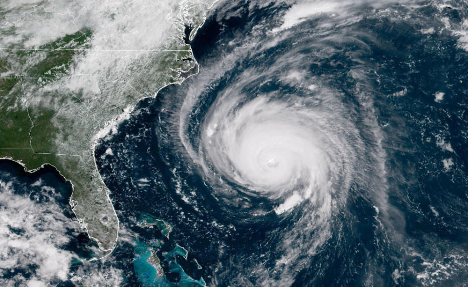 <p>In this satellite image provided by U.S. National Oceanic and Atmospheric Administration (NOAA), Hurricane Florence churns through the Atlantic Ocean toward the U.S. East Coast on Sept. 12, 2018. Florence brought torrential rain, high winds and dangerous storm surges with it. (Photo from NOAA via Getty Images) </p>