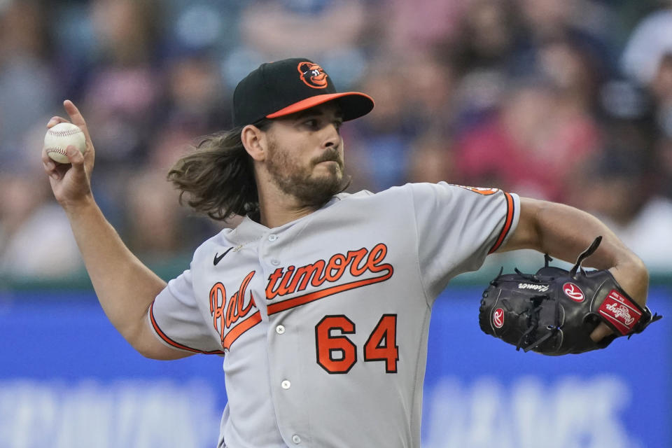 Baltimore Orioles starting pitcher Dean Kremer delivers in the first inning of a baseball game against the Cleveland Indians, Monday, June 14, 2021, in Cleveland. (AP Photo/Tony Dejak)