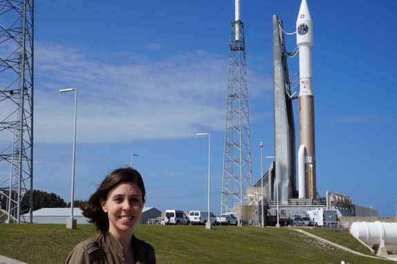 Space.com reporter Calla Cofield at Space Launch Complex 41 at Cape Canaveral Air Force Station in Florida. The Magnetospheric Multiscale mission is loaded up on top of an Atlas V rocket and is set to launch tonight (March 12) at 10:44 p.m. EDT