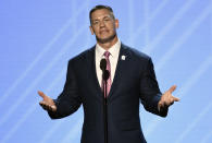 FILE - In this July 12, 2017, file photo, John Cena presents the Jimmy V perseverance award at the ESPYS in Los Angeles. While real sports have shut down in the wake of the coronavirus pandemic, WWE has pressed on and is set to run this weekend its first WrestleMania in an empty arena. WWE stood firm that the show must go on and largely moved a card highlighted by stars Brock Lesnar and John Cena to its performance center in Orlando, Florida. (Photo by Chris Pizzello/Invision/AP, File)