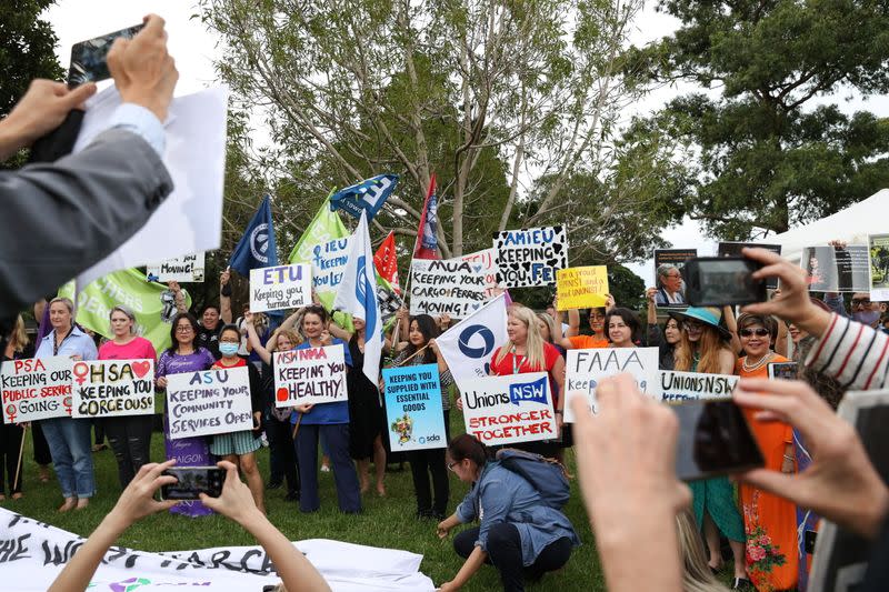 People participate in a rally for International Women's Day in Sydney