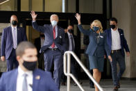 Democratic presidential candidate former Vice President Joe Biden and his wife Jill Biden wave after they voted at the Carvel State Office Building, Wednesday, Oct. 28, 2020, in Wilmington, Del. (AP Photo/Andrew Harnik)