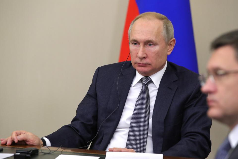 Russian President Vladimir Putin attends a joint video conference with Chinese President Xi Jinping during inaugurating the Power of Siberia pipeline in the Bocharov Ruchei residence in the Black Sea resort of Sochi, Russia, Monday, Dec. 2, 2019. China and Russia launched Monday a more than 6,000 kilometer-long gas pipeline in one realization of the countries' long-planned energy partnerships. (Mikhail Klimentyev, Sputnik, Kremlin Pool Photo via AP)