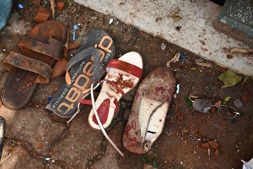 Shoes and belongings of victims are collected as evidence at St Sebastian's Church in Negombo on April 22, 2019, a day after the church was hit in series of bomb blasts targeting churches and luxury hotels in Sri Lanka. (Photo: Jewel Samad/AFP/Getty Images)