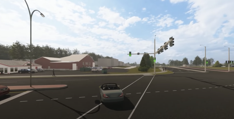 A video shows a car passing through an intersection in Charlotteville, Canada.