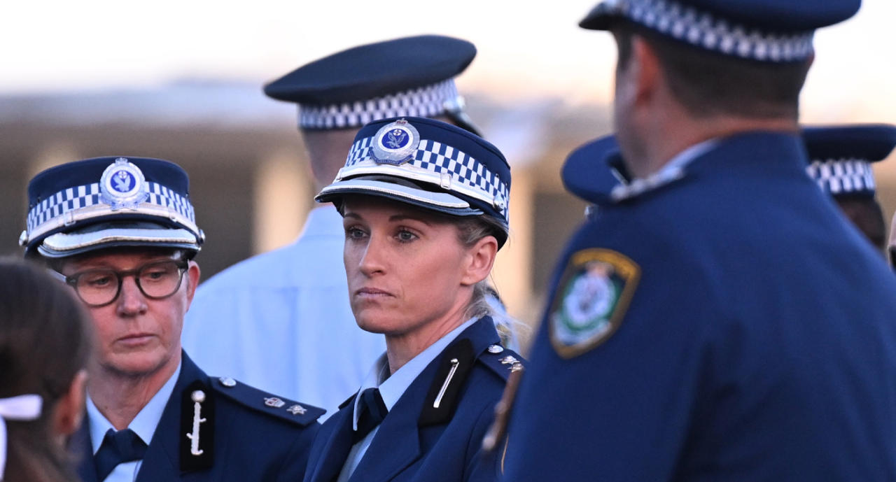 Inspector Amy Scott (centre) at Sunday's vigil. Source: AAP