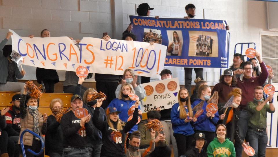 Poland fans react after junior Logan Cookinham hit a free throw for the 1,000th point of her varsity career at Onondaga Community College Saturday during the second quarter of a Section III playoff game against Immaculate Heart of Watertown.