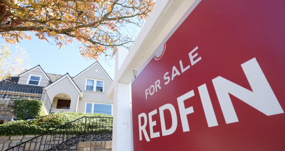 SEATTLE, WA - OCTOBER 31: A Redfin real estate yard sign is pictured in front of a house for sale on October 31, 2017 in Seattle, Washington. Seattle has been one of the fastest and most competitive housing markets in the United States throughout 2017. (Photo by Stephen Brashear/Getty Images for Redfin)