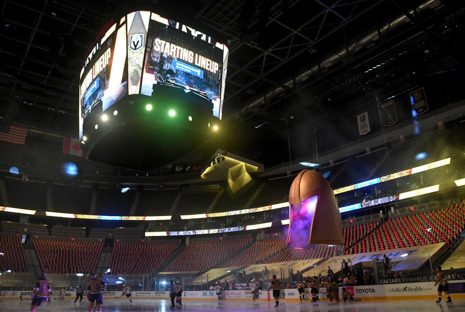 LAS VEGAS, NEVADA - JANUARY 16:  The Vegas Golden Knights and the Anaheim Ducks warm up in an empty arena before their game at T-Mobile Arena on January 16, 2021 in Las Vegas, Nevada. Games at the arena are being played without fans in attendance because of the coronavirus (COVID-19) pandemic. The Golden Knights defeated the Ducks 2-1 in overtime.  (Photo by Ethan Miller/Getty Images)