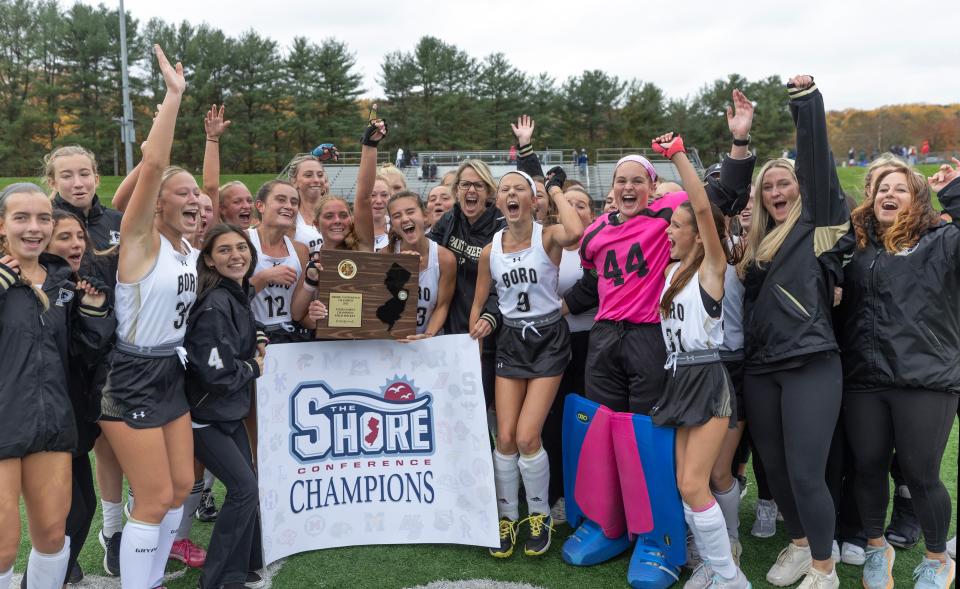 Point Pleasant Boro celebrates after it won the Shore Conference field hockey championship.