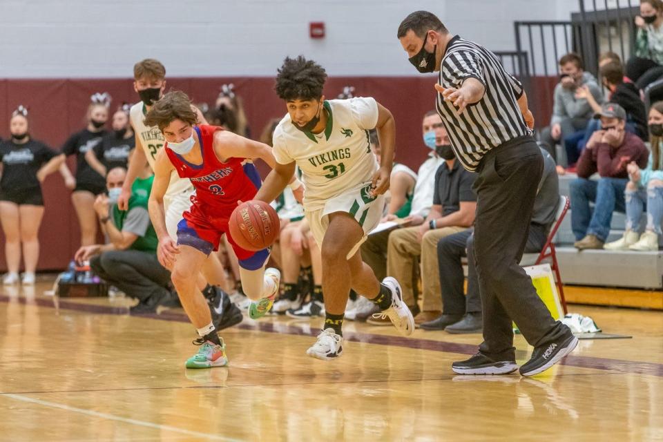 Avoca/Prattsburgh's Jamal Crowder races down the court with the basketball during the SCAA Championship game.