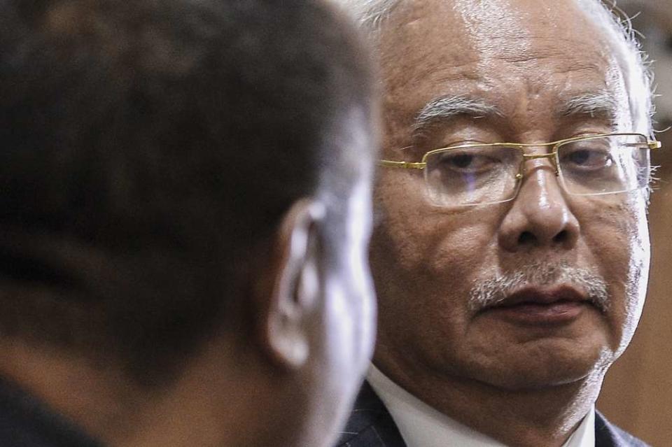 Datuk Seri Najib Razak is seen at the Kuala Lumpur Courts Complex on July 17, 2019. ― Picture by Miera Zulyana