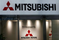 The company logo of Mitsubishi Motors is seen at its headquarters in Tokyo, Japan, August 2, 2016. REUTERS/Kim Kyung-Hoon/File Photo