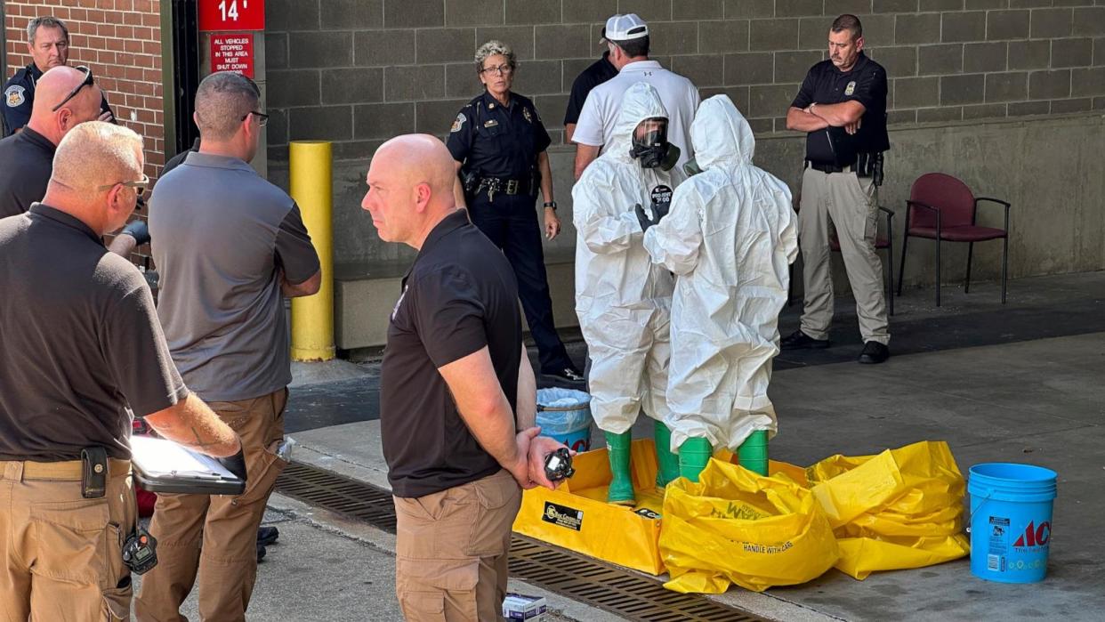 PHOTO: A hazmat crew from the National Guard's Civilian Support Team investigates after a suspicious package was delivered to election officials at the Missouri Secretary of State's Jefferson City, Mo. office on Sept. 17, 2024. (Summer Ballentine/AP)