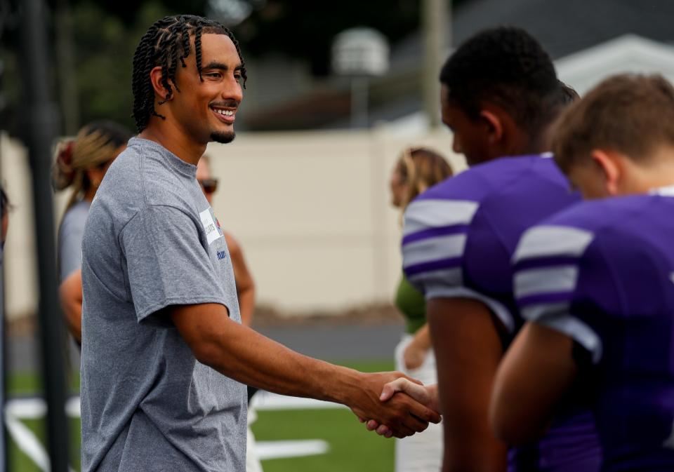 Jordan Love drops in on Green Bay West High School football practice to