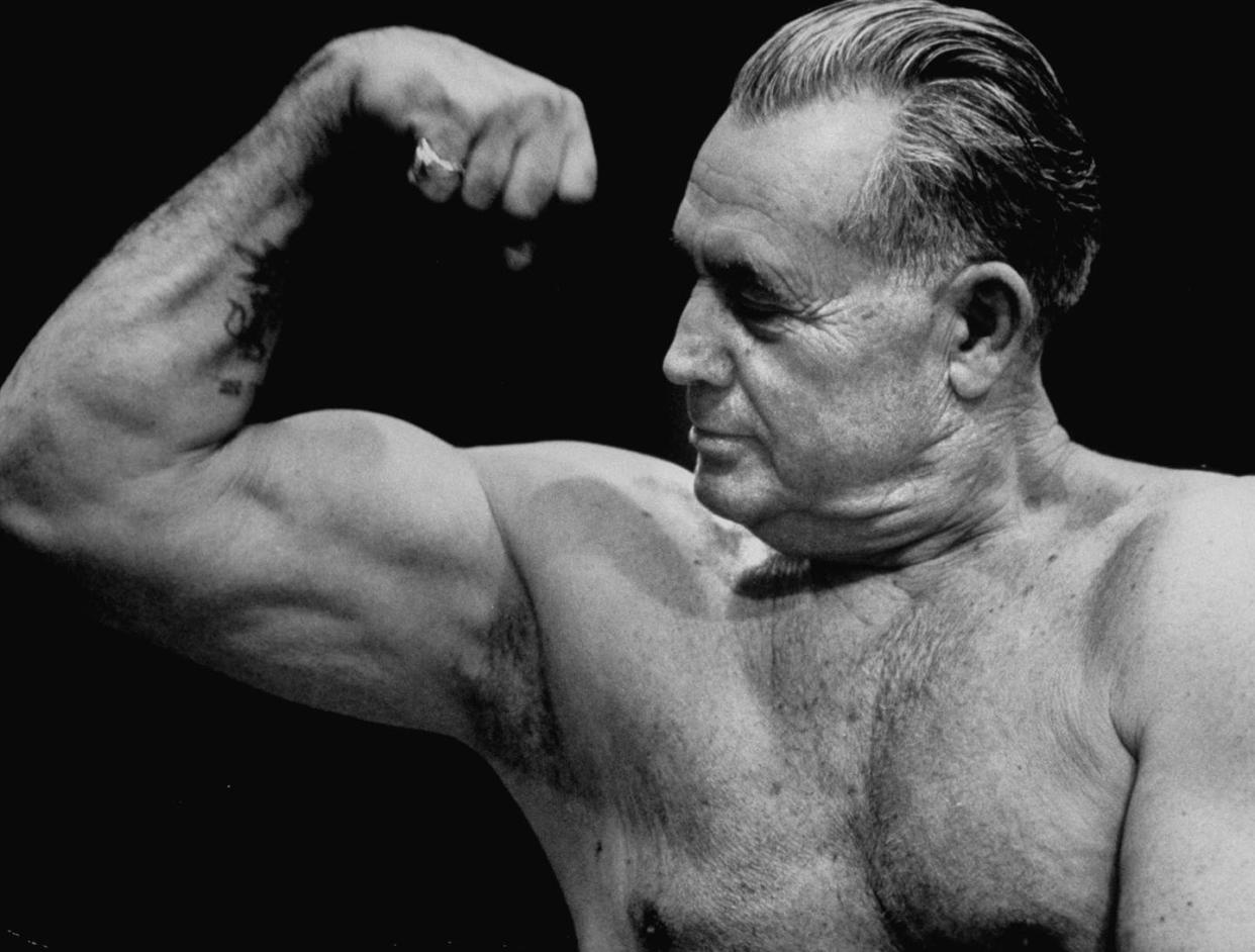 <span class="caption">Bodybuilder Charles Atlas sought to turn Americans from 'Chump to Champ.'</span> <span class="attribution"><a class="link " href="https://www.gettyimages.com/detail/news-photo/famous-body-builder-charles-atlas-flexing-his-biceps-news-photo/50777197?adppopup=true" rel="nofollow noopener" target="_blank" data-ylk="slk:Lee Lockwood/Getty Images;elm:context_link;itc:0;sec:content-canvas">Lee Lockwood/Getty Images</a></span>