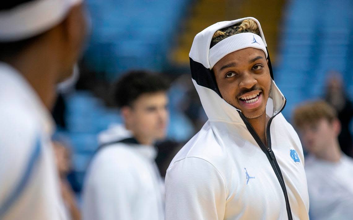 North Carolina’s Armando Bacot (5) talks with his teammates as they warm up for their game against James Madison on Sunday, November 20, 2022 at the Smith Center in Chapel Hill, N.C.