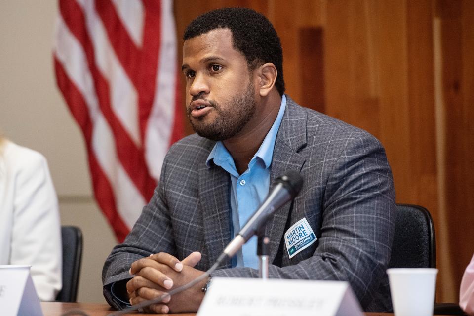 Martin Moore speaks during a Buncombe County Commissioner's debate at a CIBO meeting September 9, 2022. 