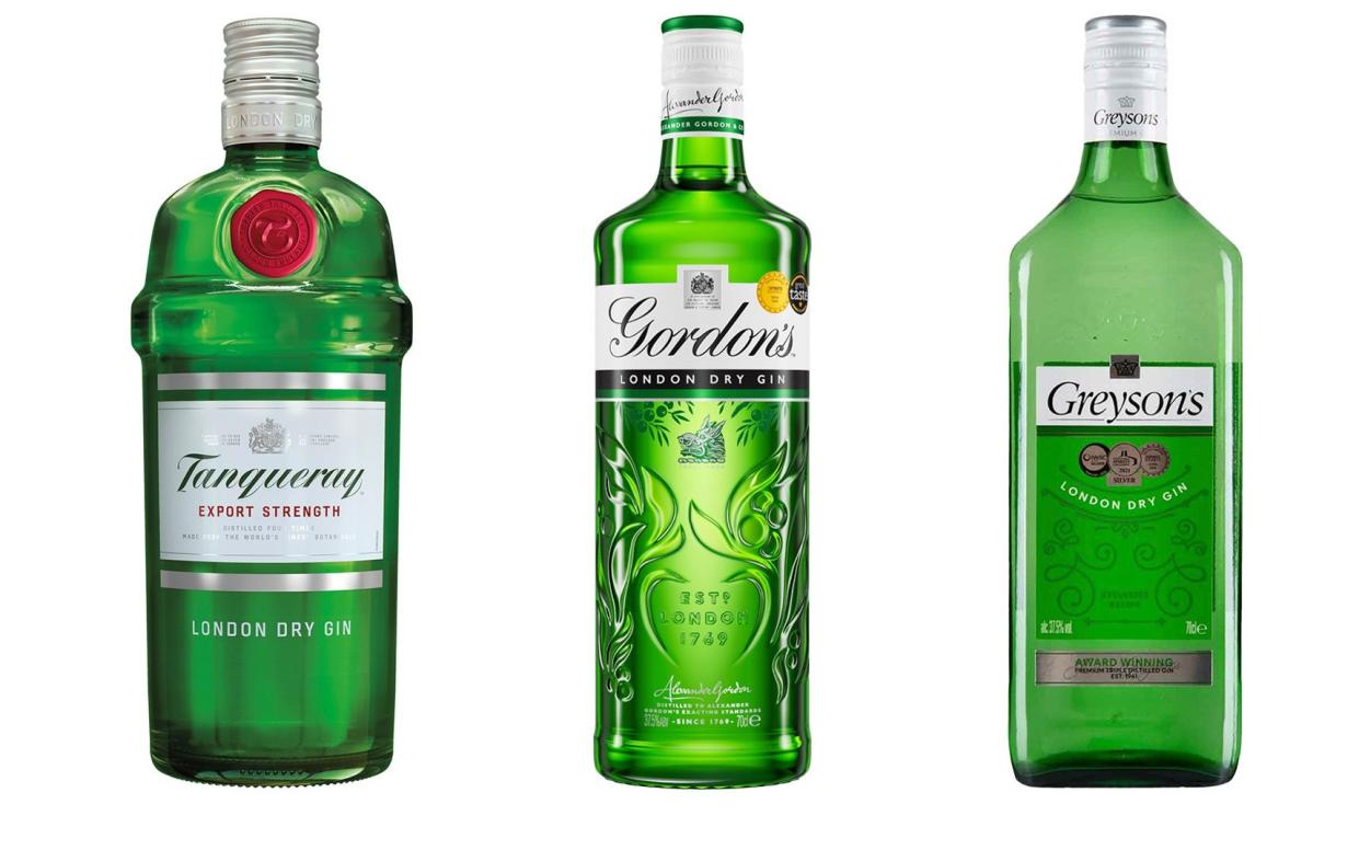 Three bottles of gin including Tanqueray Export Strength, Gordons and Aldi's Greysons