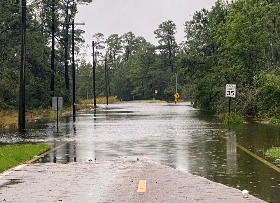 Henderson Avenue in Pass Christian, Miss. completely flooded as a result of the arrival of Hurricane Ida early Sunday, Aug. 29, 2021. (Hunter Dawkins/The Gazebo Gazette via AP) (AP)