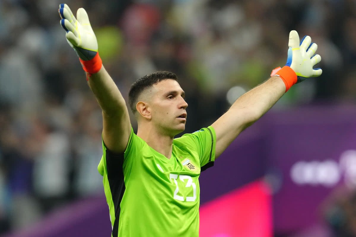 Emiliano Martinez celebrates Argentina’s first goal against Croatia (Nick Potts/PA) (PA Wire)