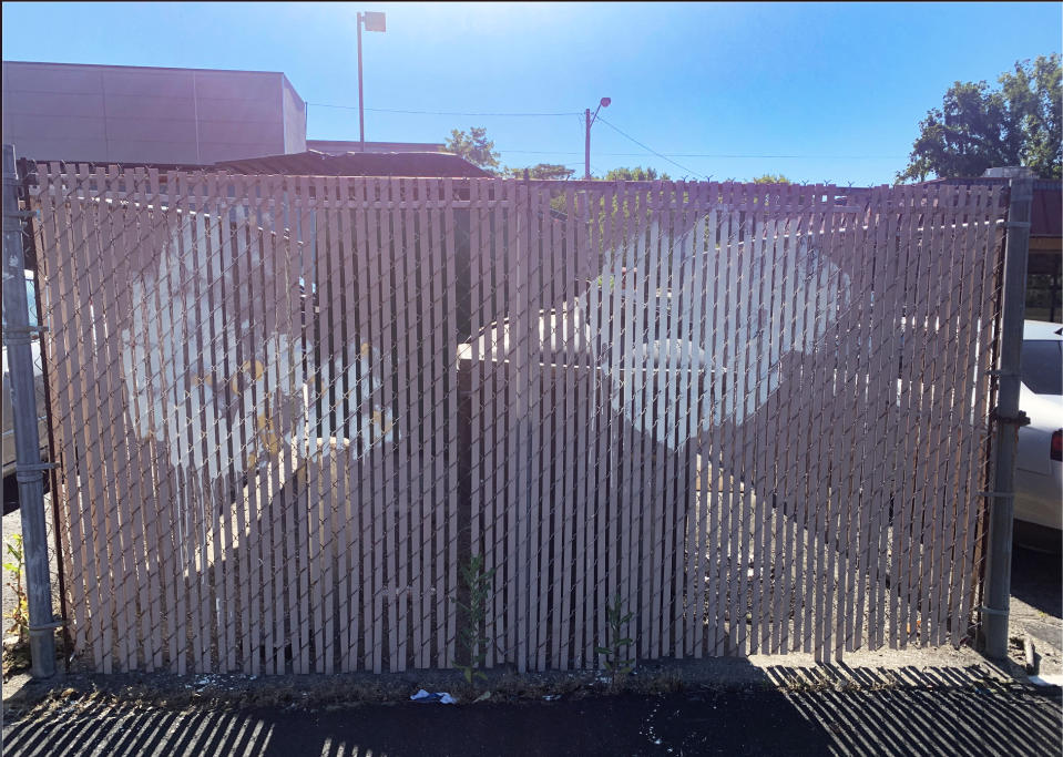 Fence with graffiti on it (Courtesy Alaina Schwartz)