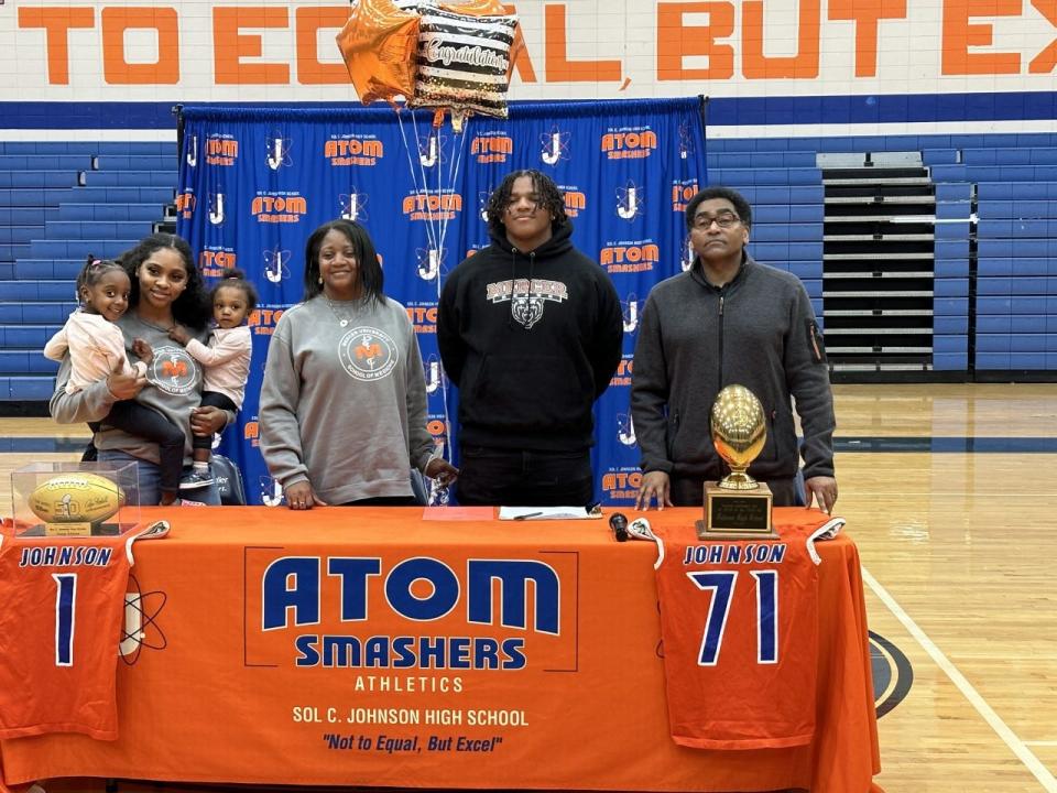 Malon Petty, pictured with his family, will play football as a preferred walk on at Mercer University.