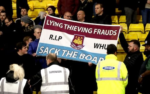 West Ham fans with a banner - Credit: PA