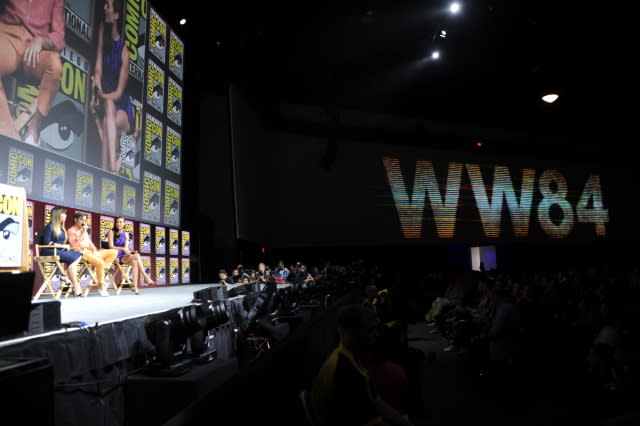SAN DIEGO, CA - JULY 21:  (L-R) Patty Jenkins, Chris Pine and Gal Gadot speak onstage at the Warner Bros. 'Wonder Woman 1984' theatrical panel during Comic-Con International 2018 at San Diego Convention Center on July 21, 2018 in San Diego, California.  (Photo by Albert L. Ortega/Getty Images)
