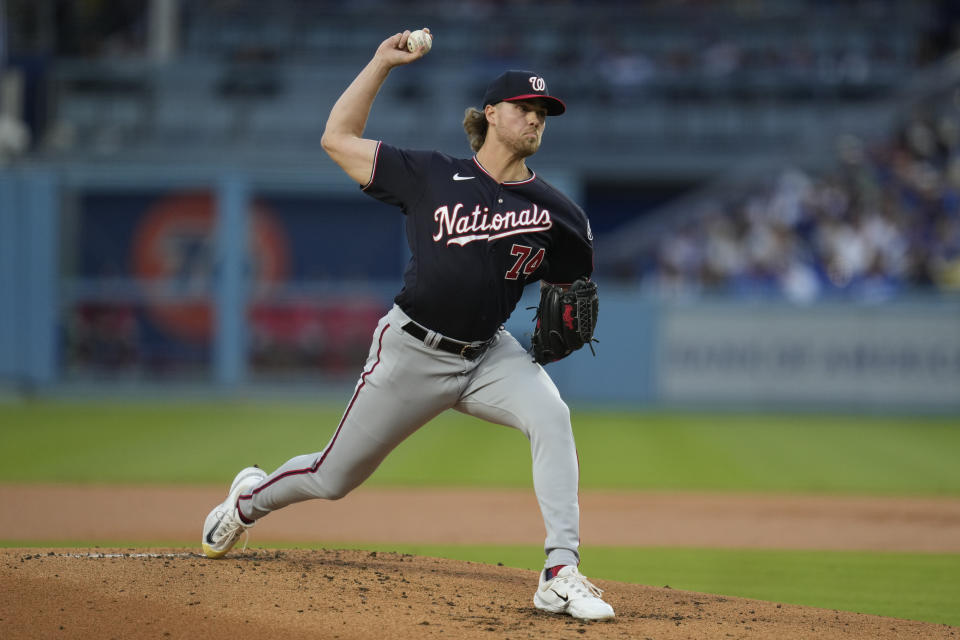 Washington Nationals starting pitcher Jake Irvin (74) throws during the first inning of a baseball game against the Los Angeles Dodgers in Los Angeles, Tuesday, May 30, 2023. (AP Photo/Ashley Landis)