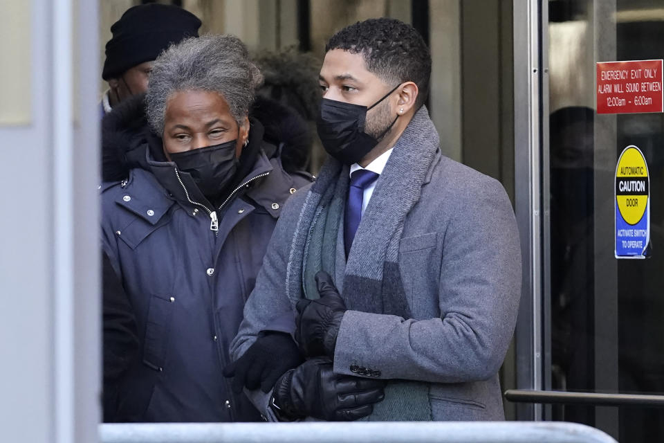 Actor Jussie Smollett, right, departs with his mother Janet, from the Leighton Criminal Courthouse, Wednesday, Dec. 8, 2021, in Chicago, after Cook County Judge James Linn gave the case to jury. (AP Photo/Nam Y. Huh)