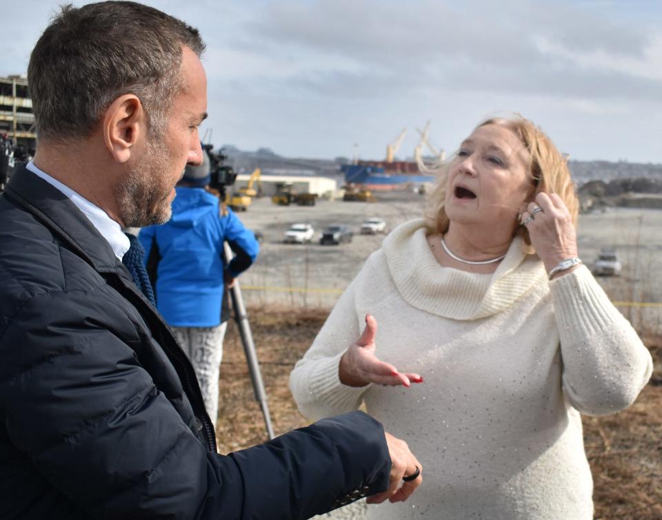 State Rep. Pat Haddad talks to Prysmian Group Senior Vice President Hakan Ozmen at the Brayton Point offshore wind manufacturing facility announcement Thursday.