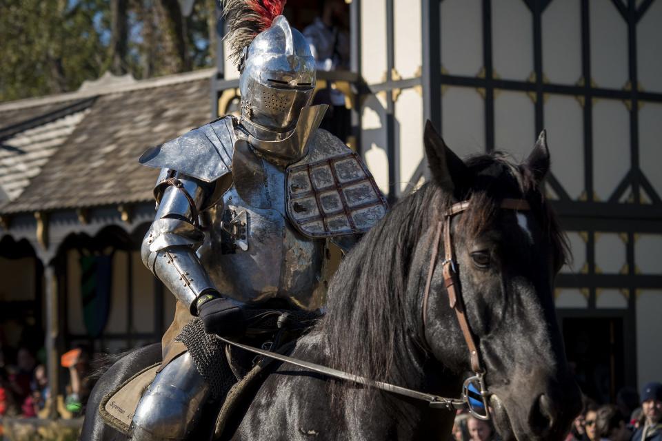 Sir Robert dons his helmet and more protective armor during the live jousting show at the Ohio Renaissance Festival Sunday, October 21, 2018 in Waynesville, Ohio.