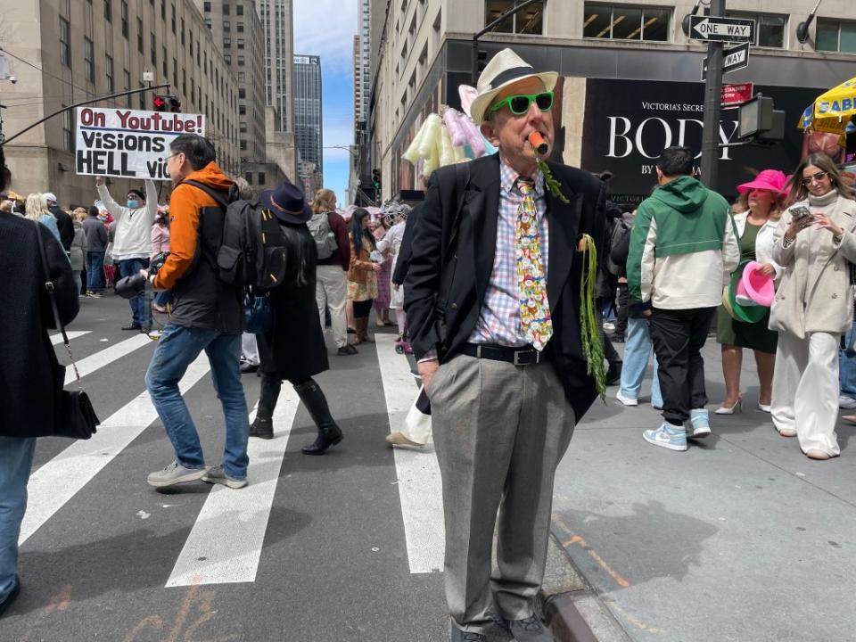 Wayne Barr likes to keep it simple at Manhattan’s Easter Parade on Sunday with a cigar painted orange like a carrot. N.Y.Post/ Khristina Narrizhnaya