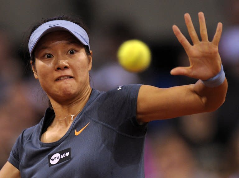 Li Na, seen in action during the final match versus Maria Sharapova at the WTA Porsche Tennis Grand Prix in Stuttgart, southwestern Germany, on April 28, 2013. Li's season to date has been somewhat of a roller-coaster