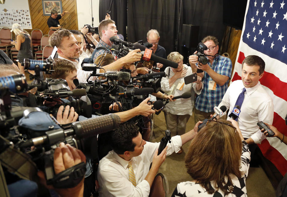 Democratic presidential candidate Pete Buttigieg speaks to the media following a Veteran's and Mental Health Town Hall event at an American Legion Hall, Friday, Aug. 23, 2019, in Manchester, N.H. (AP Photo/Mary Schwalm) (Photo: ASSOCIATED PRESS)