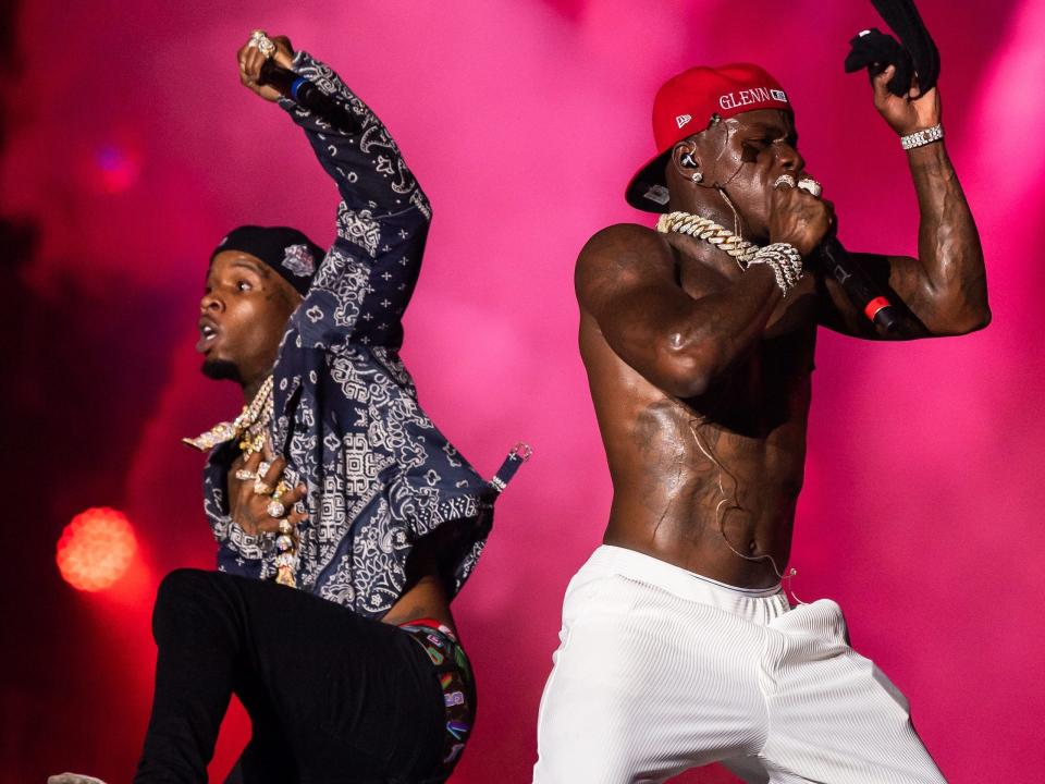 Tory Lanez and DaBaby performing onstage at Rolling Loud in Miami 2021