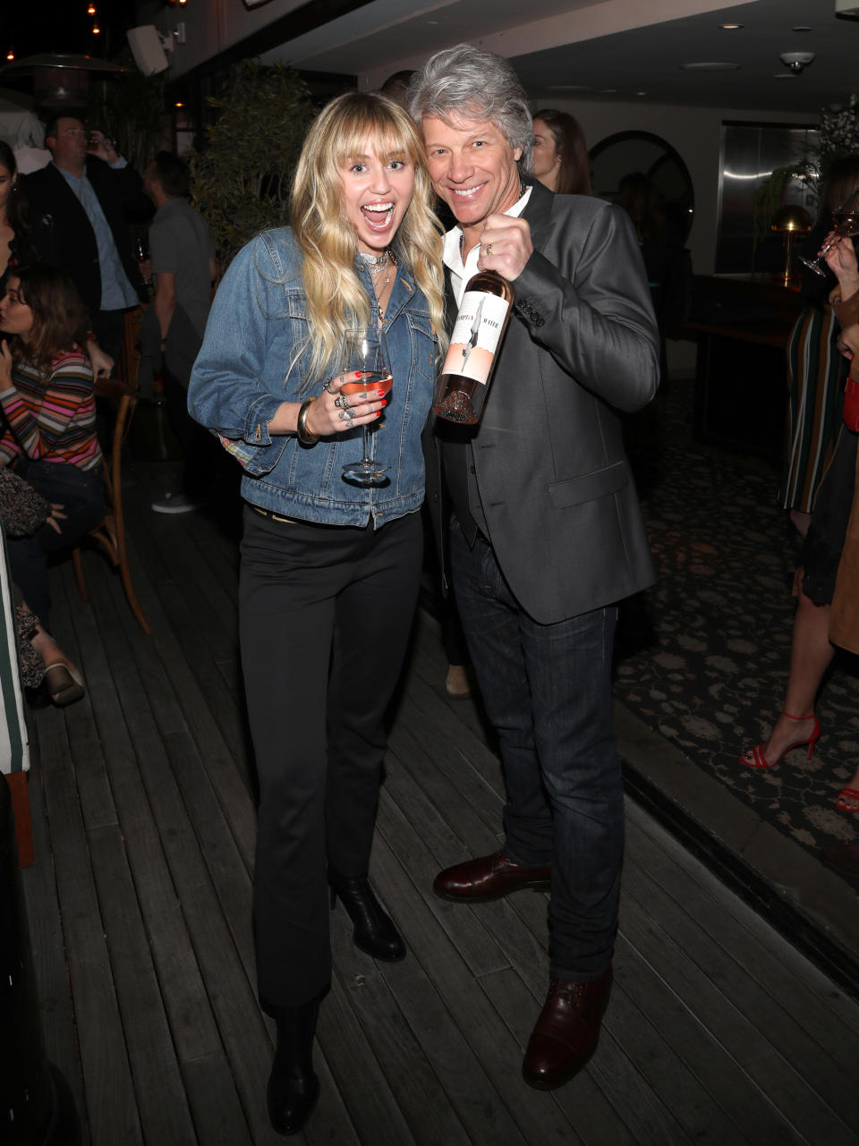 WEST HOLLYWOOD, CALIFORNIA - MARCH 28:  Miley Cyrus and Jon Bon Jovi attend the Hampton Water Rosé Celebrates LA Launch at Harriet's Rooftop on March 28, 2019 in West Hollywood, California. (Photo by Jerritt Clark/Getty Images for Hampton Water)