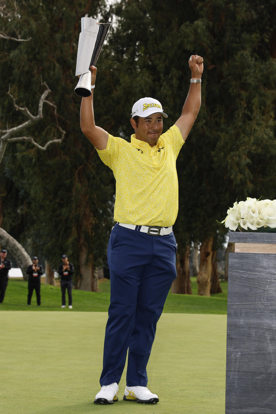 Hideki Matsuyama, of Japan, holds the the Genesis Invitational trophy after he won the final round of the Genesis Invitational golf tournament at Riviera Country Club, Sunday, Feb. 18, 2024, in the Pacific Palisades area of, Los Angeles. (AP Photo/Ryan Kang)