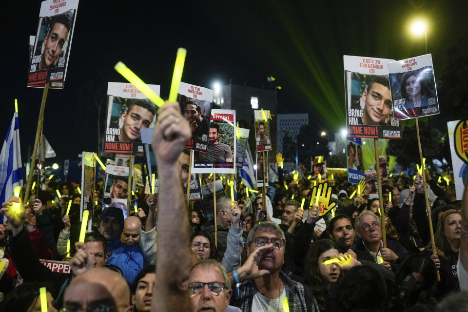 FILE - Israeli demonstrators call on the government to secure the release of hostages held in the Gaza Strip by Hamas outside the Knesset, Israel's parliament, in Jerusalem, on April 7, 2024. Fears are rising that time is running out for hostages in Gaza that are still alive. Nearly eight months later, there are 43 hostages whose remains are being held by Gaza militants and roughly 80 who have not been declared dead. (AP Photo/Ohad Zwigenberg, File)