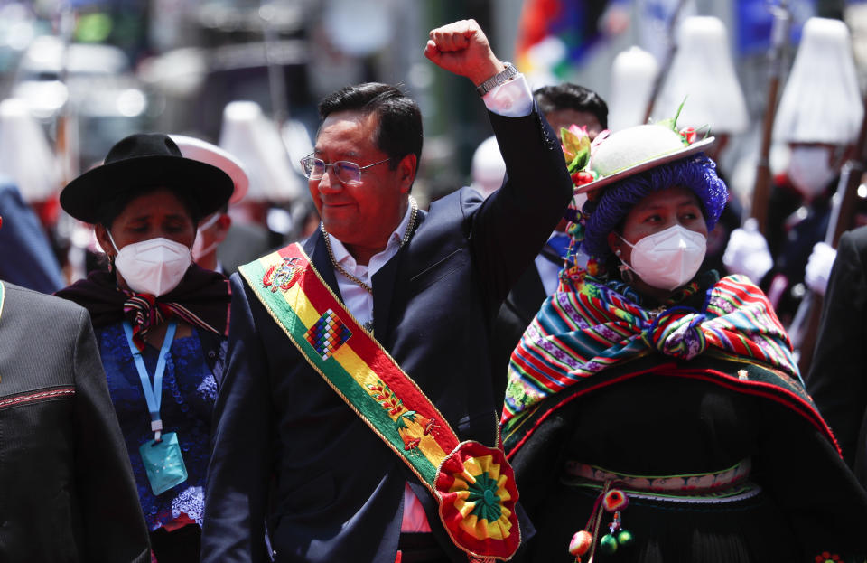 Bolivia's new President Luis Arce leaves the Congress on his inauguration day in La Paz, Bolivia, Sunday, Nov. 8, 2020. (AP Photo/Juan Karita)