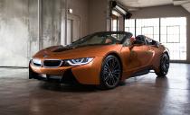 <p>Proving that plug-in hybrids aren't just about reducing fuel costs, <a rel="nofollow noopener" href="https://www.caranddriver.com/bmw/i8" target="_blank" data-ylk="slk:BMW's unabashedly futuristic i8 coupe and roadster;elm:context_link;itc:0;sec:content-canvas" class="link ">BMW's unabashedly futuristic i8 coupe and roadster</a> feature exotic swing-up doors, spaceship styling, and six-figure price tags. Every i8's turbocharged three-cylinder engine and electric motors team to produce 369 horsepower, with all four wheels getting some of the power. The i8's as quick as it looks, too, with a zero-to-60-mph time of 3.6 seconds in our testing (and that's before BMW upped the sports car's output and battery capacity for 2019). Its 18-mile electric-only range and 69-MPGe rating reflect its emphasis on performance, as does its tiny back seat.</p>