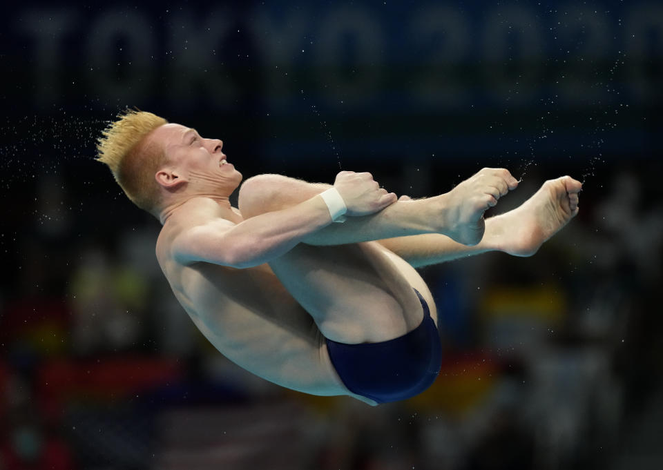 Andrew Capobianco of United States competes in men's diving 3m springboard final at the Tokyo Aquatics Centre at the 2020 Summer Olympics, Tuesday, Aug. 3, 2021, in Tokyo, Japan. (AP Photo/Dmitri Lovetsky)