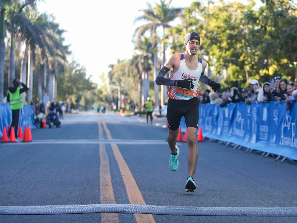 Jonathan Werble of Weston finishes second during the Barron Collier Companies Naples  Half Marathon in Naples on Sunday, Jan. 15, 2023.