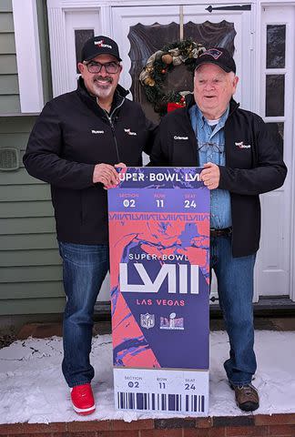 <p>verison</p> Don Crisman with a Super Bowl ticket