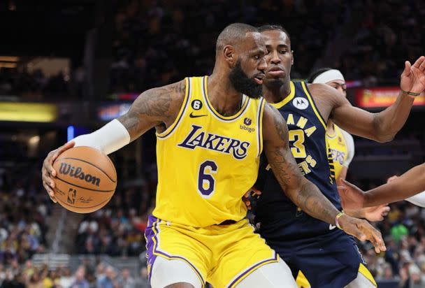 PHOTO: LeBron James of the Los Angeles Lakers dribbles the ball against the Indiana Pacers at Gainbridge Fieldhouse on Feb. 2, 2023, in Indianapolis. (Andy Lyons/Getty Images)