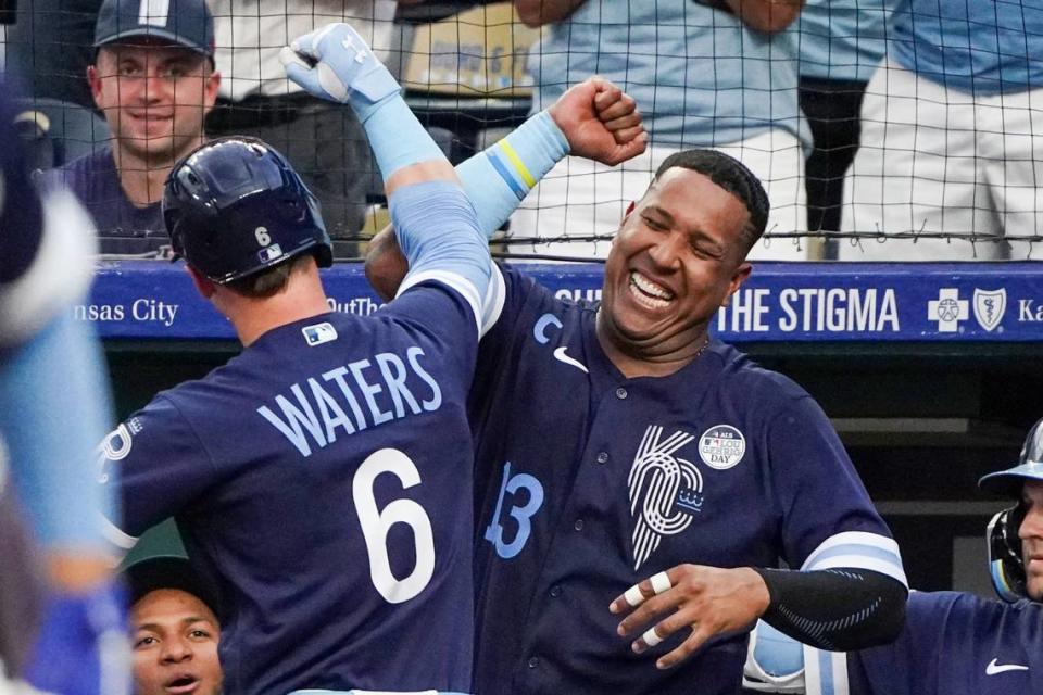 Kansas City Royals center fielder Drew Waters (6) celebrates with catcher Salvador Perez (13) after hitting a solo home run against the Colorado Rockies in the third inning at Kauffman Stadium on June 2, 2023.