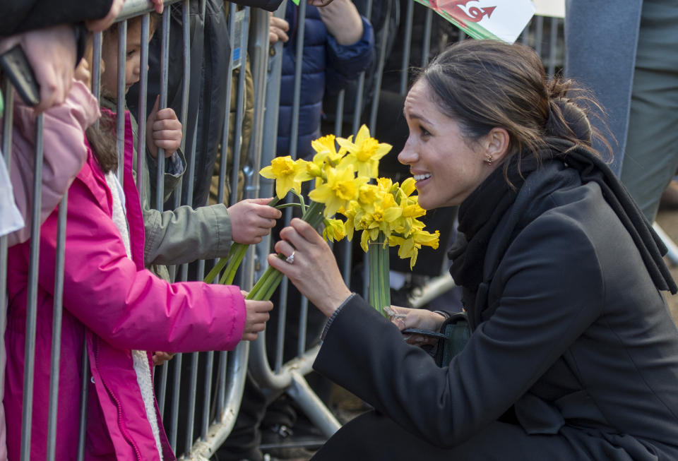 She even got flowers!&nbsp; (Photo: ARTHUR EDWARDS via Getty Images)
